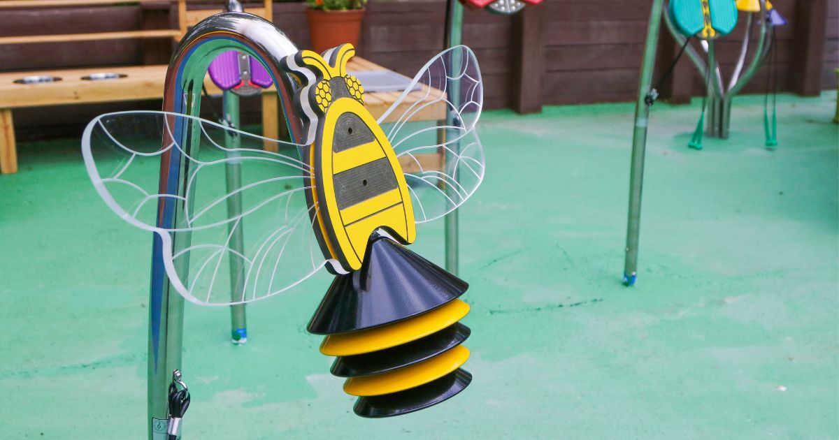 The Enchanted Cove Playground's New Musical Garden The Discovery Center